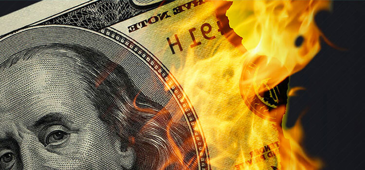 fraud burning dollar